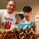Takeru Kobayashi (R) Joey Chestnut look on at the Nathan’s Famous Fourth of July International Hot Dog Eating Contest official weigh-in ceremony in 2009.